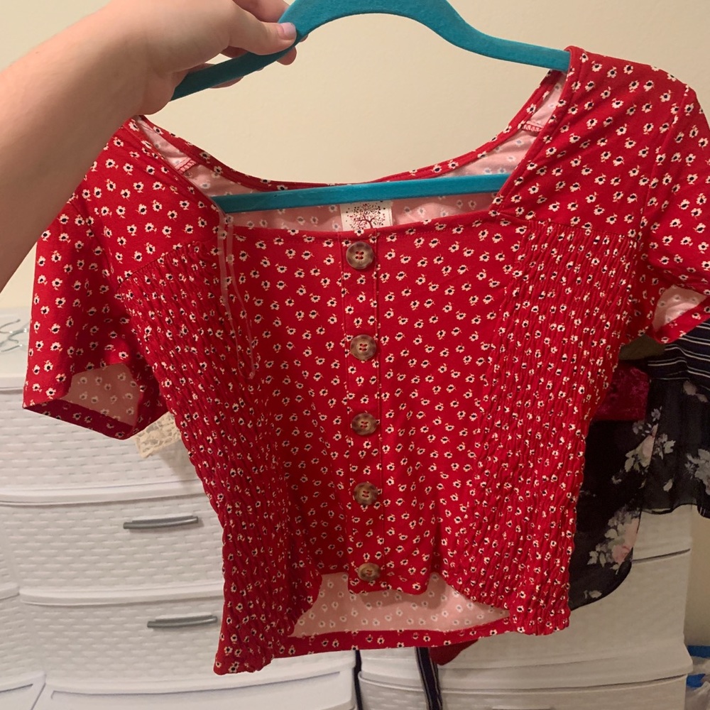 red and white flower design top, price negotiable